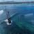 Global-Zoo-Surfing-Videos-Surfing-Over-Crystal-Clear-Water-Shipwrecks-Nusa-Lembongan-t1oF7QPy2Qg-1033x581-0m10s